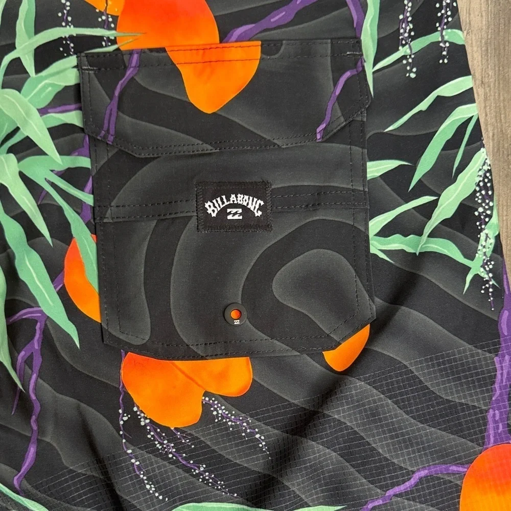Billabong Black Board Shorts with Orange and Green Design